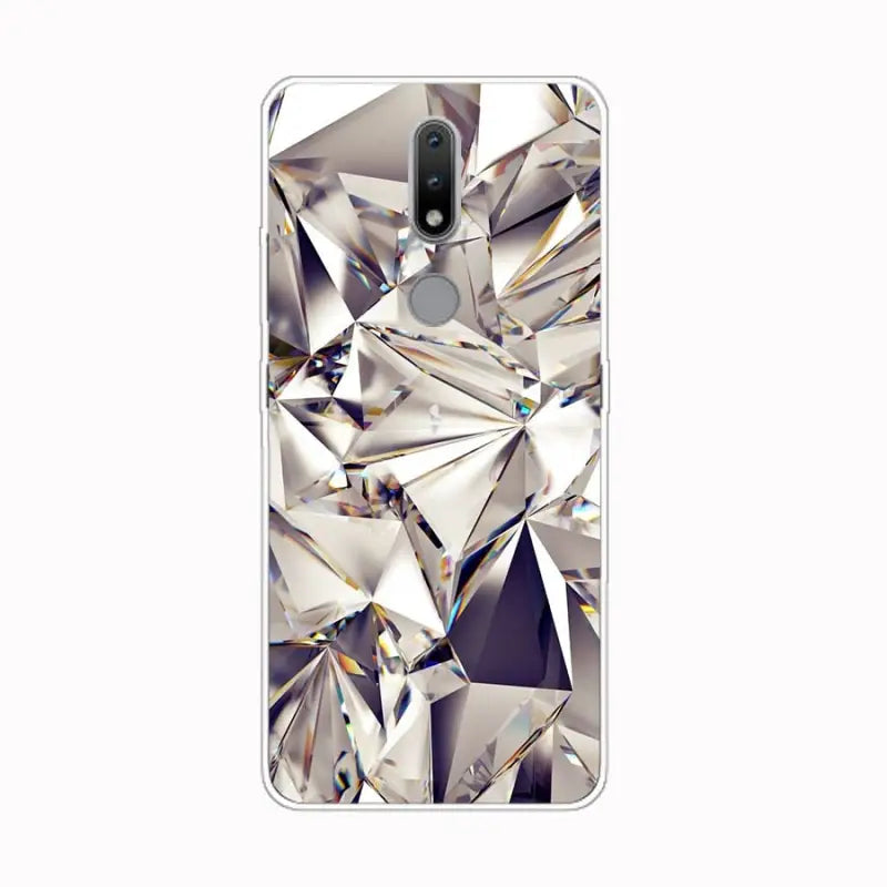 a close up of a cell phone with a diamond design on it