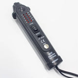 there is a remote control that is connected to a power strip