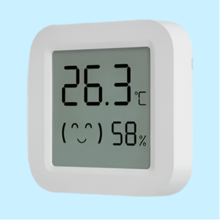 Digital thermometer and hygrometer displaying temperature and humidity.