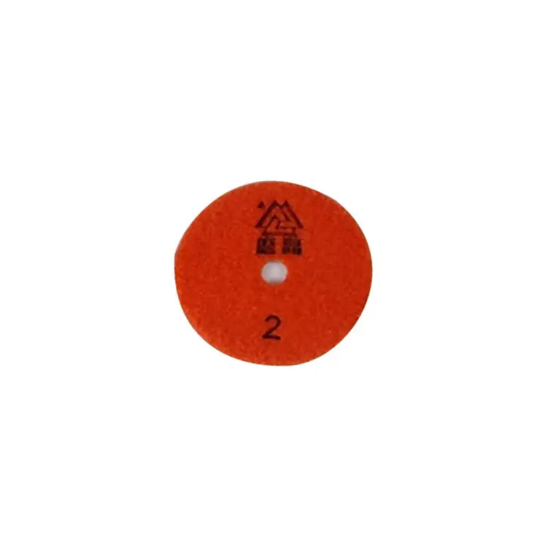 a red disc with a chinese writing on it