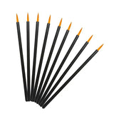 a set of black and yellow paint brushes