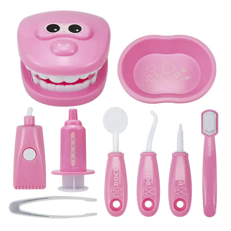 a pink toy dentist set with a toothbrush, toothbrush, and toothbrush