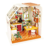 a doll house with a desk and chairs