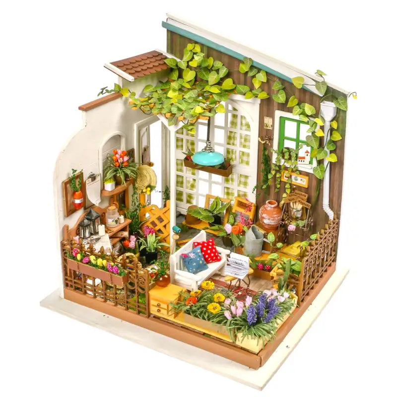 a doll house with a garden inside