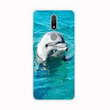 a dolphin swimming in the ocean phone case