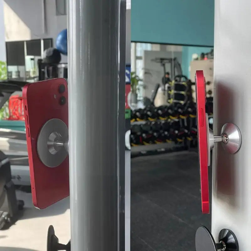 a gym with a red and white door