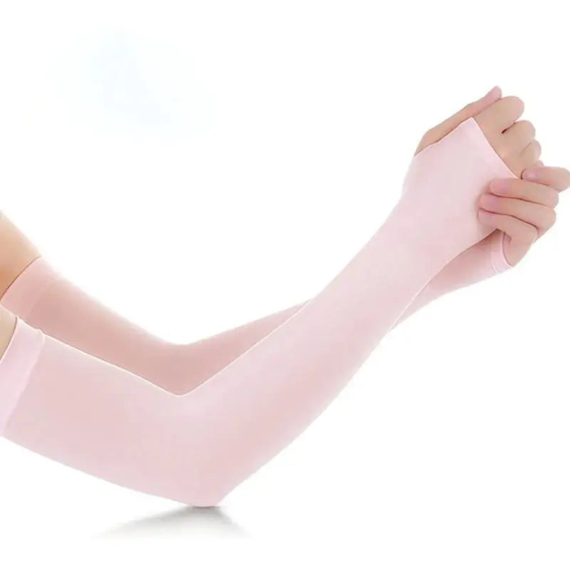 a woman’s arm with a pink arm sleeve
