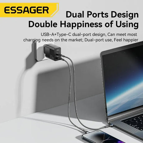 Dual-port USB charger with USB-A and USB-C ports connected to a laptop and smartphone.