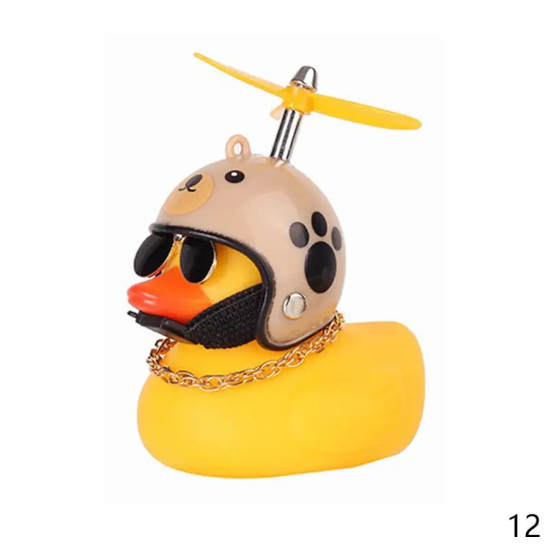 a duck with a yellow hat and sunglasses on a yellow rubber duck