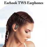a woman with earphones on her head