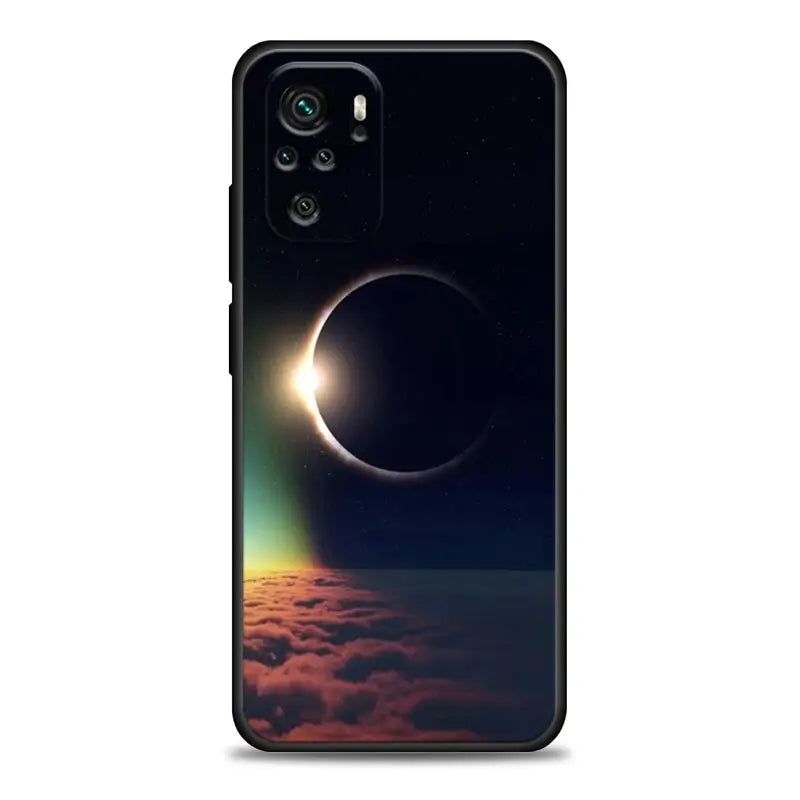 the eclipse of the sun over the clouds phone case