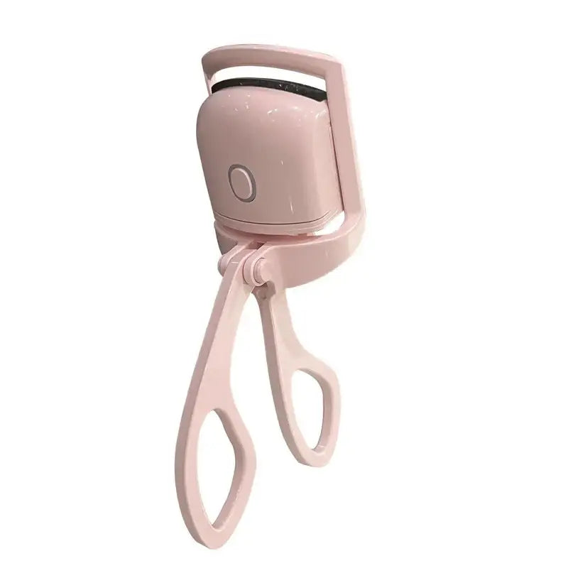 a pink hair dryer with a handle