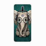 a close up of a cell phone with a elephant wearing headphones