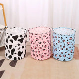 three different color leopard print storage bags