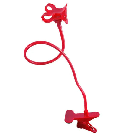 a red plastic object with a metal handle