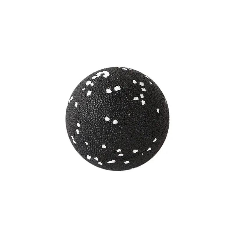 a black and white ball with white spots