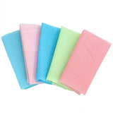a set of four colorful dishcloths on a white background