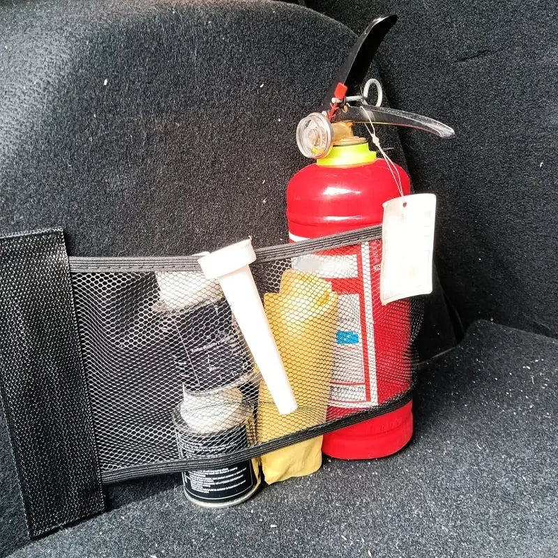 a fire exor in the back seat of a car