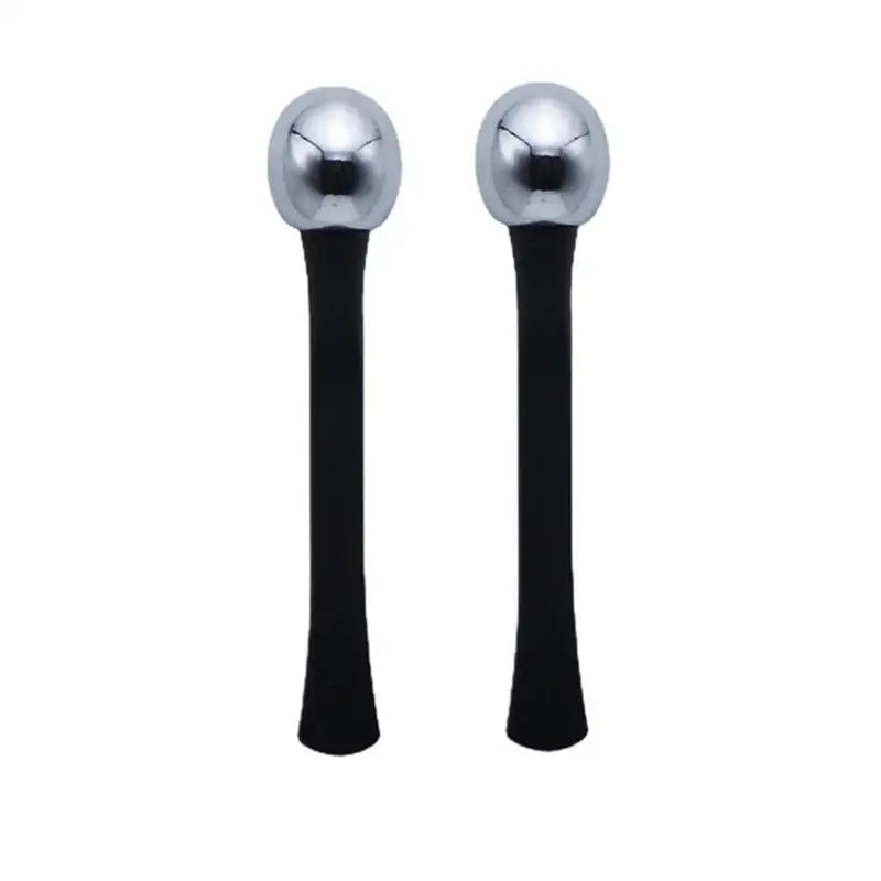 a pair of black and silver metal ball shaped handles