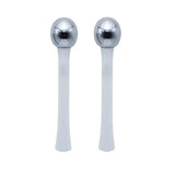 a pair of silver spoons with a ball on the top