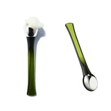 a spoon and a spoon with a flower on it