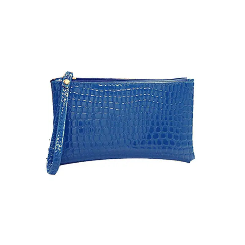 the blue crocodile skin clutch bag