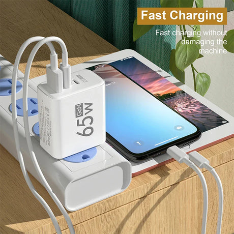 Fast charging adapter with multiple USB ports connected to a smartphone.