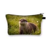 a small pouch bag with an image of a maroo in the grass