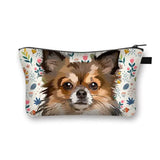 a small cosmetic bag with a dog face on it