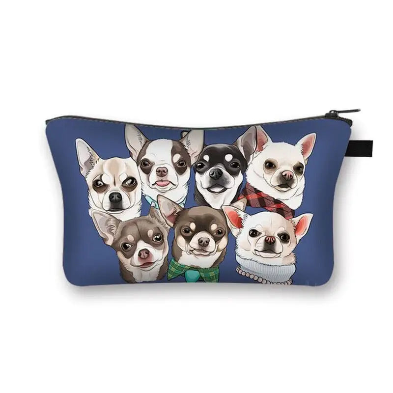 a blue cosmetic bag with a group of dogs on it