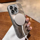 Feather-patterned iPhone with MagSafe charger.