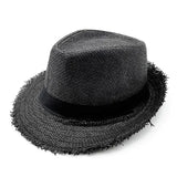 a black hat with fringes on it