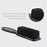 the hair brush is a black brush with a black handle