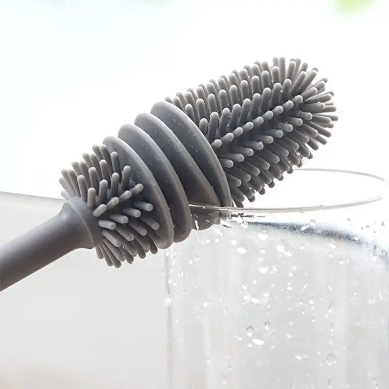 a glass filled with water and a plastic straw