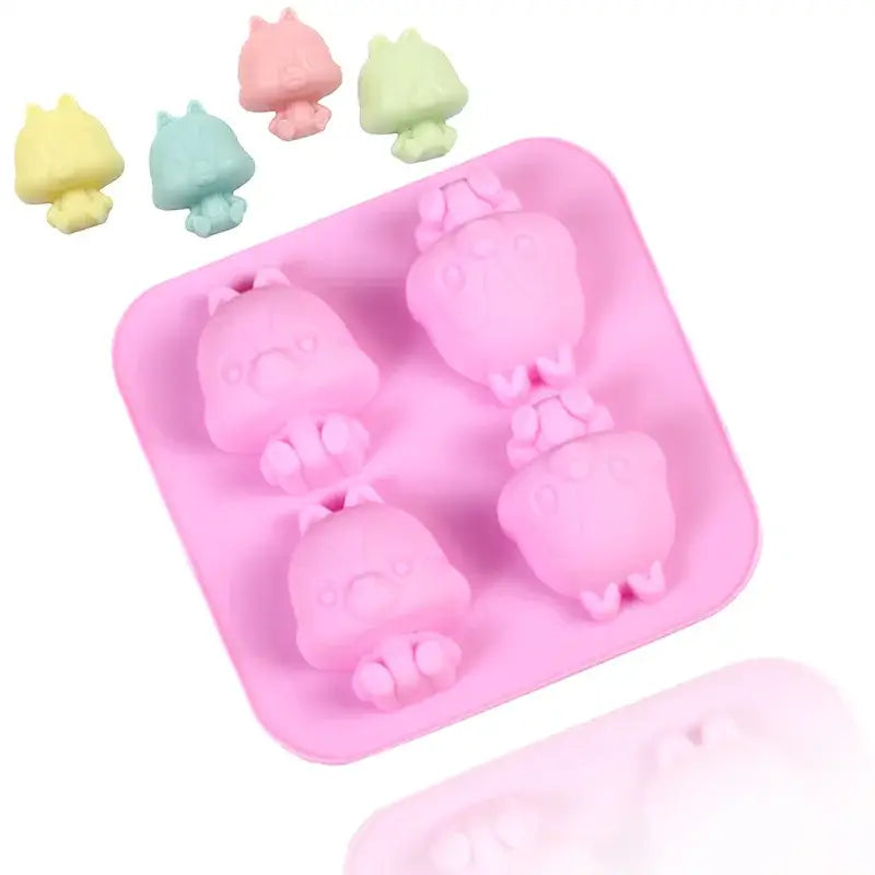 there are five little pigs in a pink tray with a pink bow