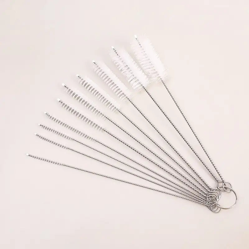 a set of five hair pins with a metal wire