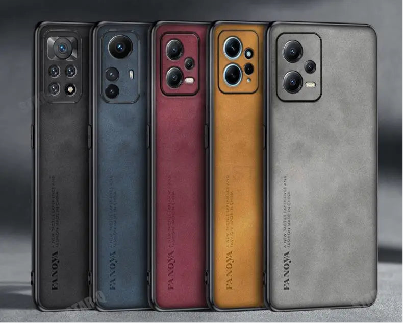 Five smartphones in different colors lined up side by side, showcasing their rear camera arrays.