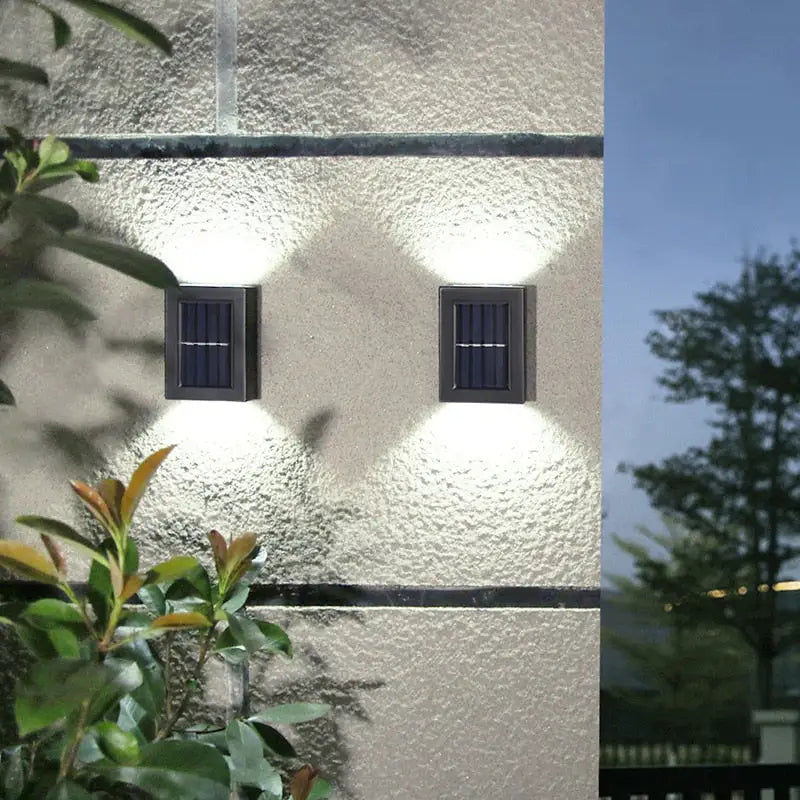 a wall light with two lights on it