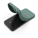 A flexible, dark teal phone case partially covering a black smartphone.