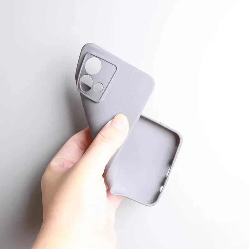 Flexible gray silicone phone case with a raised camera bump.