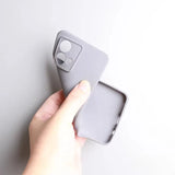 Flexible gray silicone phone case with a raised camera bump.