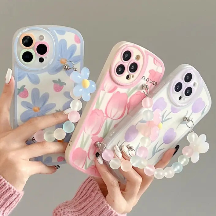 Floral-patterned phone cases with 3D flower decorations.