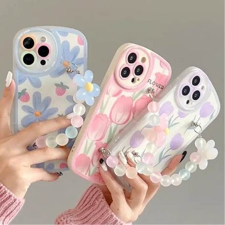 Floral-patterned phone cases with 3D flower decorations.