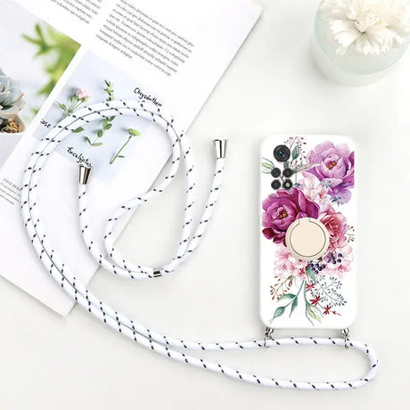 a white phone case with a floral design