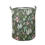 the large storage bag in black with pink and green leaves