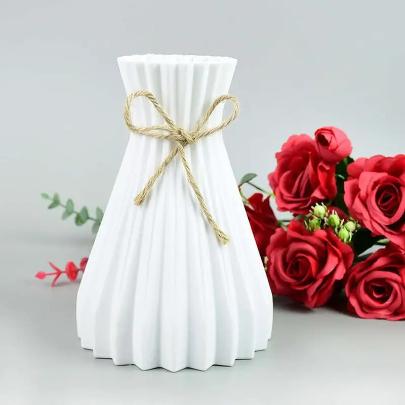 a vase with a bow on it