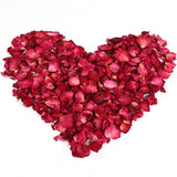 a heart made out of red roses