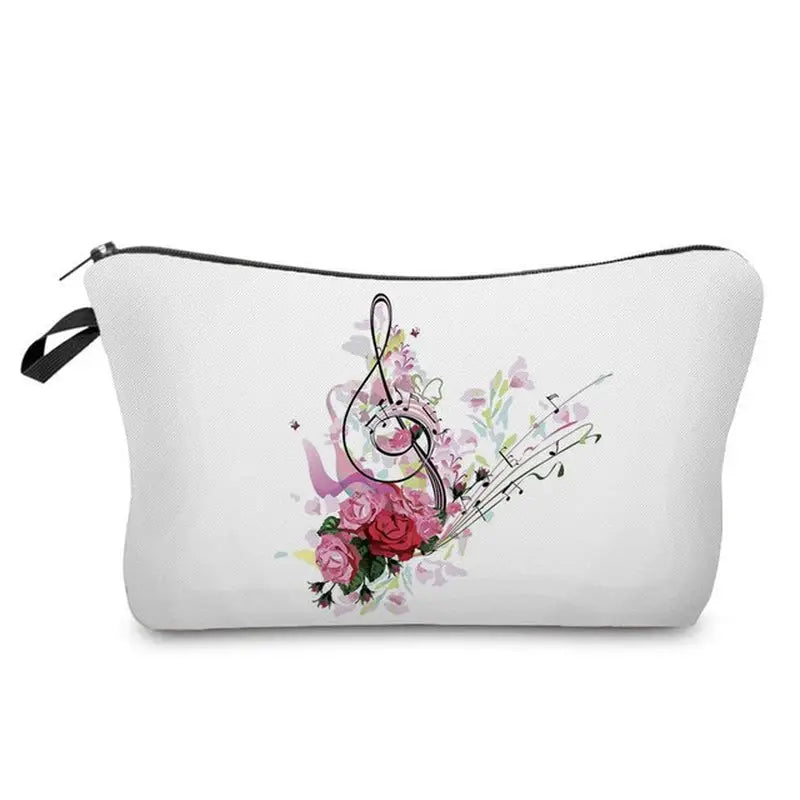 a white cosmetic bag with a floral design