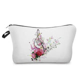 a white cosmetic bag with a floral design