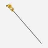 a gold and silver sword with a dragon head on it